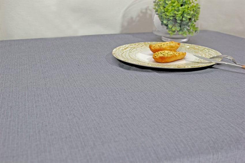 Vandafvisende akryldug i kold grå nuance med rolig struktur – tilpasses i ønskede mål og leveres rullet på rør