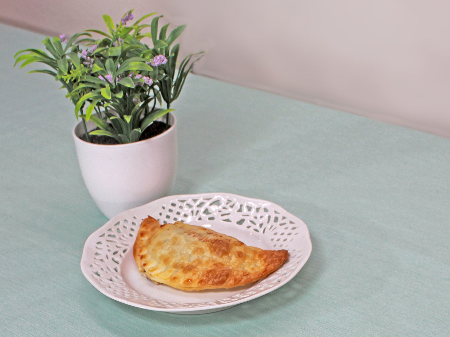 Vandafvisende akryldug i afdæmpet turkis nuance med vævet struktur – tilpasses i ønskede mål og leveres rullet på rør