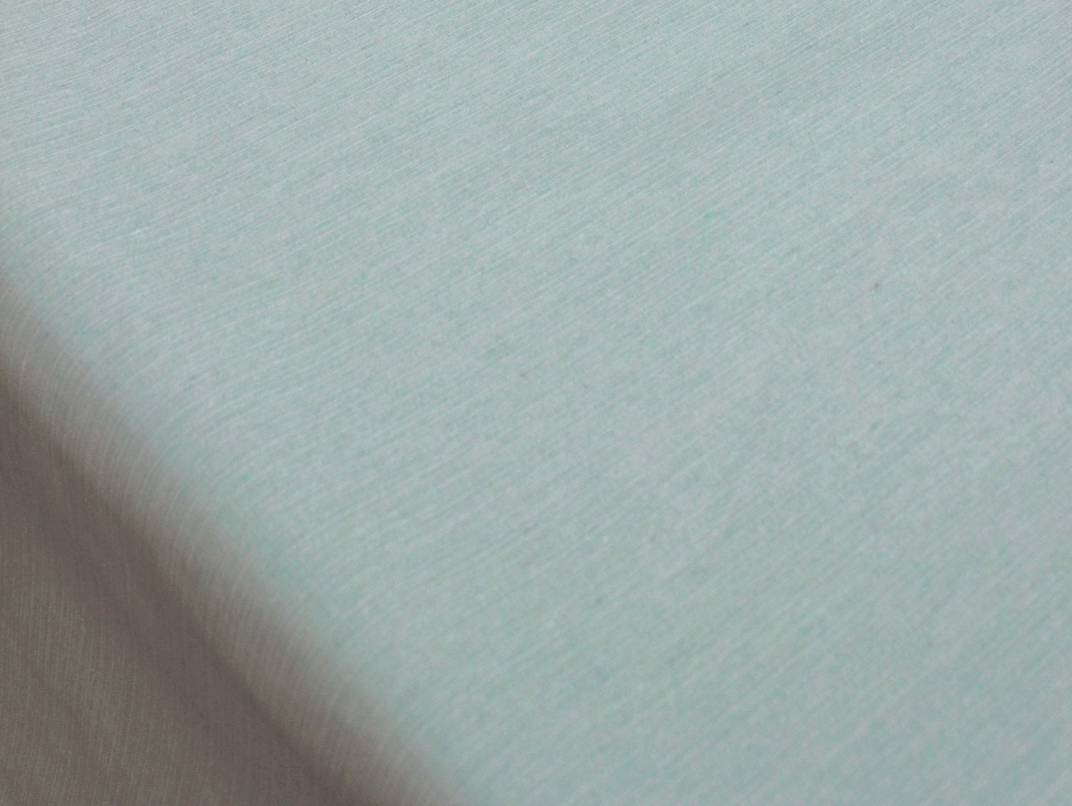 Vandafvisende akryldug i afdæmpet turkis nuance med vævet struktur – tilpasses i ønskede mål og leveres rullet på rør