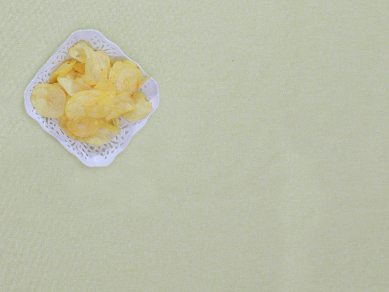 Vandafvisende akryldug i sart limegrøn nuance – tilpasses i ønskede mål og leveres rullet på rør